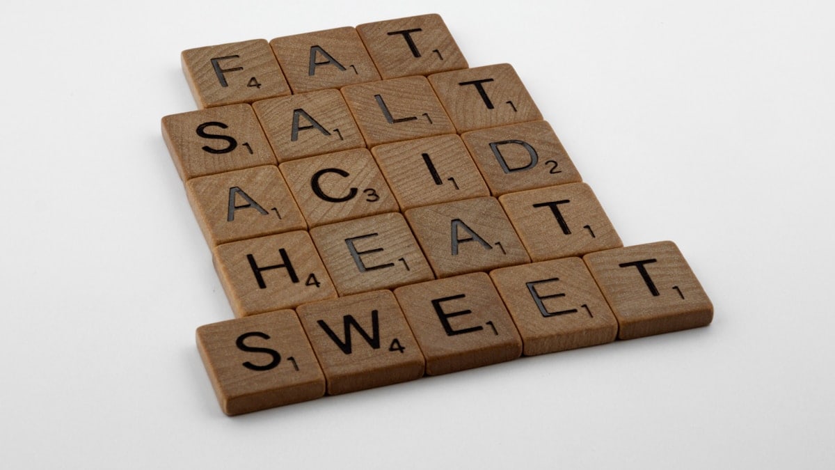 scrabble, scrabble pieces, lettering, letters, wood, scrabble tiles, white background, words, salt, fat, acid, heat, sweet, dessert, humour, humor, afters, cookery, cooking, cordon bleu, basics, cookery basics, samin nosrat, ingredients,